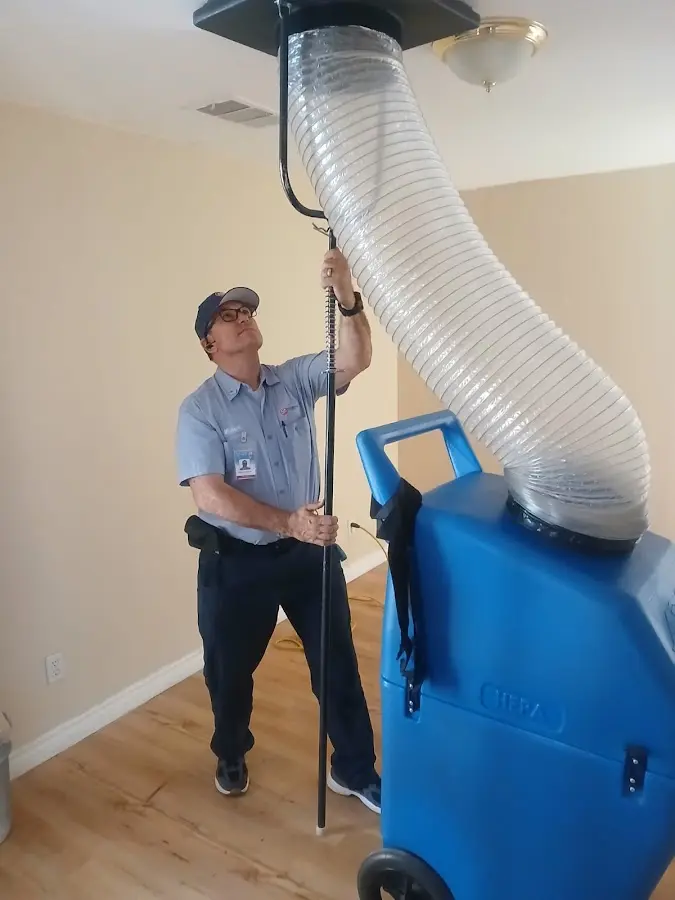 HVAC Installation technician using HEPA equipment in Selma